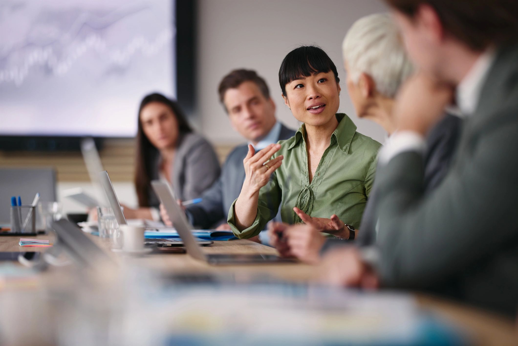 Entrepreneur speaking with a colleague in an office